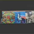 Vibrant Collage Art Installation With Stop Capitalism Sign Flower Patterns Blue Scene And Graffiti