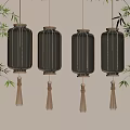 Traditional Hanging Lanterns With Tassels And Warm Yellow Light Near Bamboo Leaves