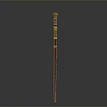 Ornate Red Staff Weapon With Golden Decorative Top And Polished Shaft