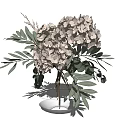Transparent Glass Vase With Beige Hydrangea Flowers And Green Leaves Arrangement