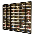 Shoe Rack With Various Colorful Shoes Neatly Arranged On Multiple Shelves
