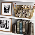 Golden Decorative Ornament Set with Sculptures Frames Books and Metal Basket on Shelf