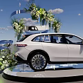 Floral Installation For Car Display With White Car Ribbons And Cloud Decorations