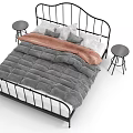 Double Bed with Black Metal Frame Gray Quilt Brown Blanket and Round Side Stools