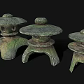 Traditional Wooden Stone Lanterns With Carved Bases In Three Different Sizes
