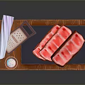 Raw Sliced Meat on Wooden Cutting Board with Tape Measure Paper Towels Small Bowl
