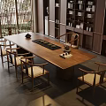 Tranquil Tea Room With Long Wooden Table Wooden Chairs Bookshelves Tea Sets And Natural View