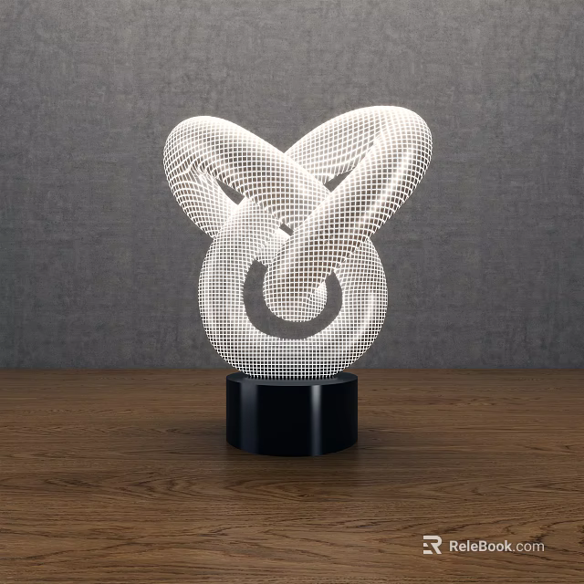 White Knotted Decorative Light With Hollow Mesh Design And Black Base On Wooden Tabletop 3d model 