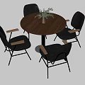 Round Walnut Dining Table With Black Chairs Wooden Armrests And Metal Legs