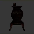 Vintage Cast Iron Stove With Three Legged Design And Textured Surface