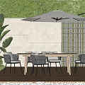 Modern Outdoor Wooden Table With Gray Chairs Umbrella And Green Plants