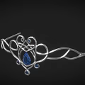 Elegant Silver Jewelry With Intricate Curly Metal Design Central Blue Gemstone And Small Blue Stones