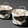 Two Woven Storage Baskets with Natural Material Handles and Simple Modern Design