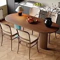 Modern Restaurant Interior With Oval Wooden Dining Table Chairs Fruit Bowl Vase And Table Lamp