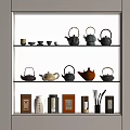 Elegant Tea Set Display with Teapots Teacups and Tea Caddies on Wooden Shelf