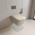 Modern Wall Mounted Toilet in Sleek Bathroom with White Tiles and Control Panel
