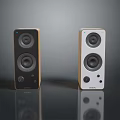 Modern Black And White Electronic Speakers With Gold Trim And Compact Design