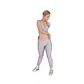 Woman In White Sports Vest Leggings And White Sneakers On Gear Background Human Engine Theme