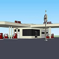 Modern Gas Station With Auto Service Building And Red Fuel Pumps