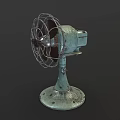 Vintage Electric Fan with Metal Cage Worn Green Base and Retro Design