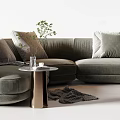 Modern Sectional Sofa with Beige Green Upholstery Pillows Side Table and Plant
