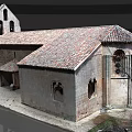 European Architecture With Red Tiled Roof Stone Walls And Arched Windows