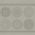 Various Decorative Ceiling Medallions Featuring Carved Patterns On Light Colored Panel 3d model