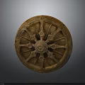 Ancient Wooden Wheel With Intricate Carved Spokes And Decorative Design