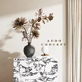 Black Vase With Dried Flowers On Marble Table In Modern Interior With Audo Concept Sign
