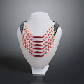 Stylish Multilayer Necklace With Red And White Beads Black Shoulder Accents On Mannequin