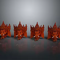 Red Ganesha Statues With Decorative Crowns And White Tusks Arranged On Dark Background With Reflections