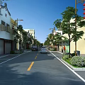 Traditional Style Building Facades With White Walls Grilles And Red Lanterns Along Street