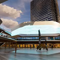 Modern Commercial Plaza With Sculpture Open Space Pedestrians And Tall Building
