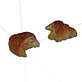 Two Freshly Baked Bitten Croissants With Golden Crust And Flaky Layers