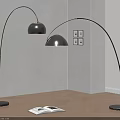 Black Arched Floor Lamps with Round Base Open Book Nearby Light Wall Wooden Floor