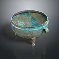 Ancient Bronze Three Legged Vessel With Green Patina And Dual Handles