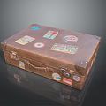 Vintage Brown Leather Suitcase With Multiple Travel Stickers And Brass Clasps