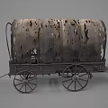 Vintage Covered Wagon With Tattered Canvas Top And Wooden Wheels