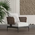 Modern Accent Chair With Woven Armrests White Cushion Metal Legs Plant And Decorative Wall Art