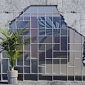 Broken Concrete Wall With Glass Panel Metal Grid And Potted Plant