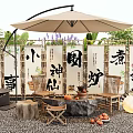 Outdoor Chair with Patio Umbrella Bamboo Screens and Stone Coffee Table in Natural Garden Setting