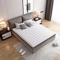 Comfortable Quilted White Mattress In Modern Bedroom With Gray Headboard And Nightstands