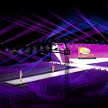 Fashion Show Stage with Bright Lights and Model Walking on Runway