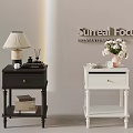 Black And White Modern Nightstands With Lamp Flowers And Decor Items