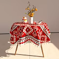 Dining Table With Red And White Geometric Patterned Tablecloth Tassels White Vase And Yellow Flowers