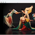 Women In Traditional Costumes Performing Elegant Dance With Graceful Movements And Waving Sleeves