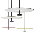 Modern Circular Pendant Lights With Glass Shades And Metal Frames For Contemporary Interior Design