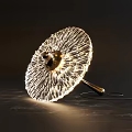 Unique Shaped Abstract Table Lamp With Radiant Light Lines And Modern Artistic Brass Base
