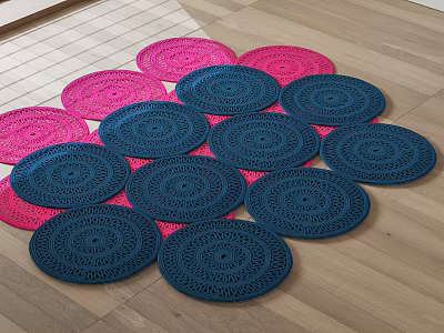 Stylish Shaped Rugs Display With Pink And Blue Circular Woven Patterns On Wooden Floor 3d model