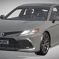 Toyota Sedan with Modern Sleek Design in Gray Featuring UK License Plate and Stylish Headlights